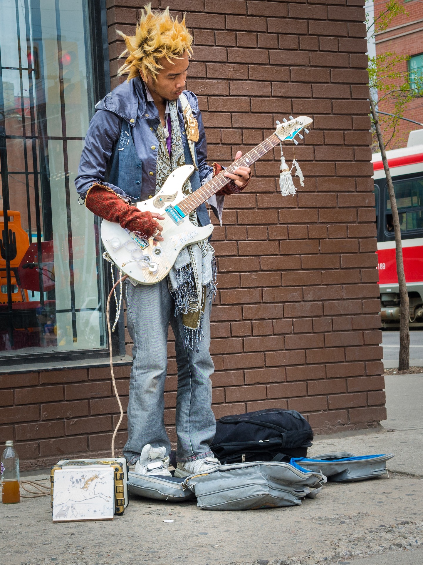 busking guitar player